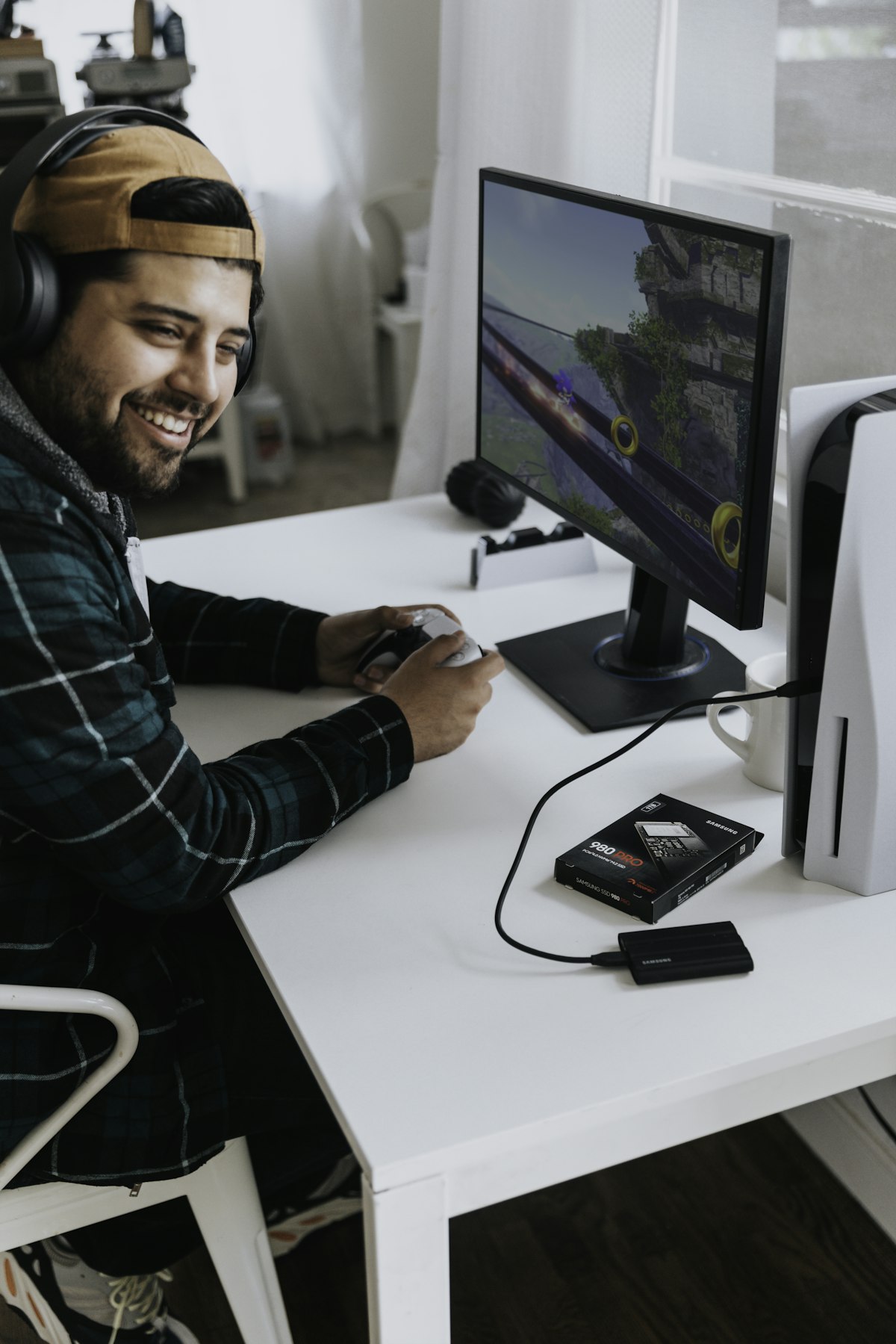Desk with headphones and monitor in a focused workspace